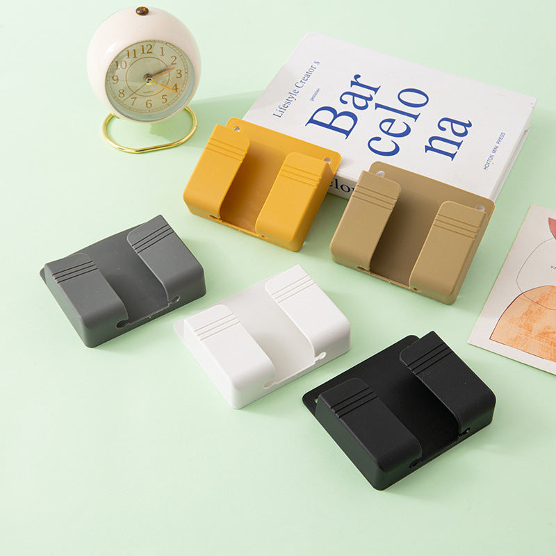 Wall-mounted mobile phone charging case stand